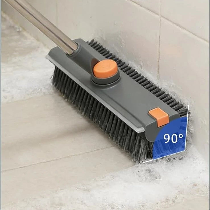Multi-functional floor brush with flexible bristles cleaning a bathroom and a wooden floor.